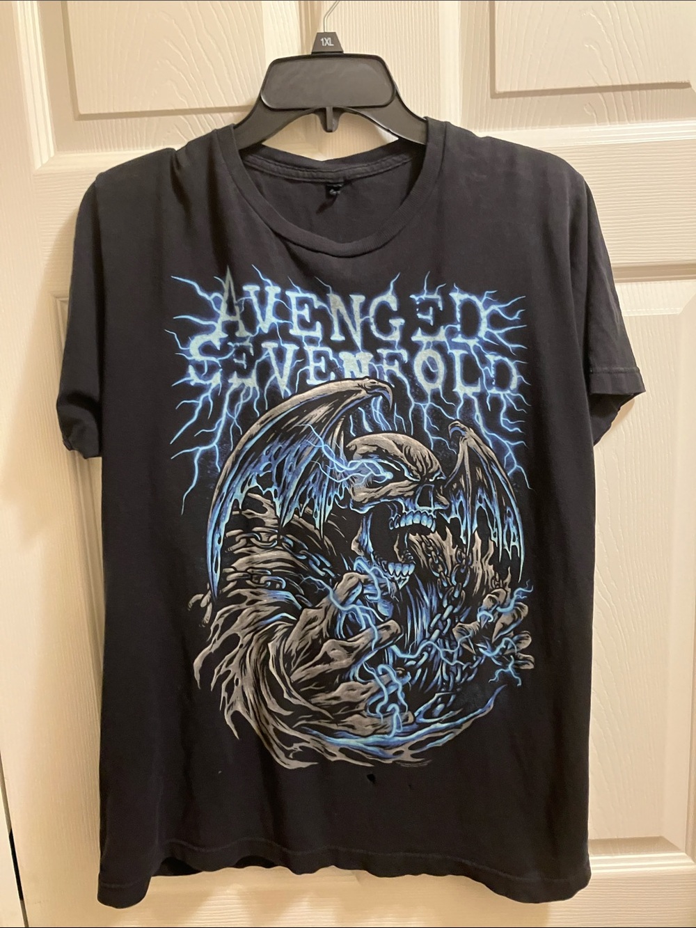 Avenge Sevenfold black t-shirt w/a few holes on front see pics